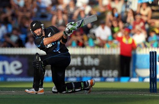 New Zealand's Martin Guptill hits a shot during their second Twenty20 international against England on February 12, 2013